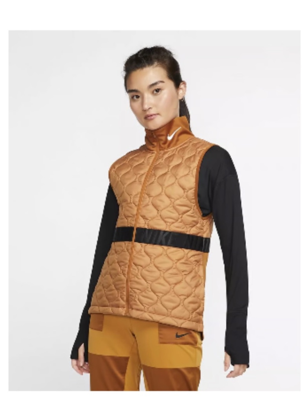 Nike Quilted Sleeveless Vest in Rust and Black